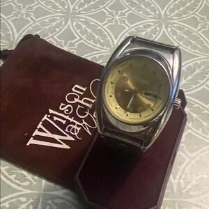 Nixon “You Know” Siver and Gold Women's Watch